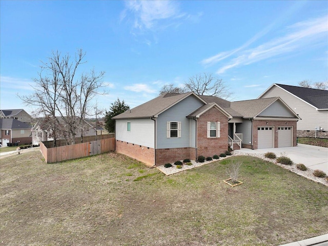 view of front facade featuring a garage and a front yard