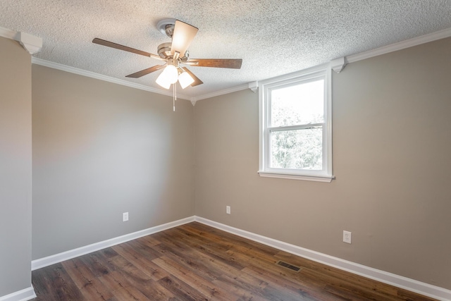 unfurnished room featuring ornamental molding, dark wood-type flooring, ceiling fan, and a textured ceiling