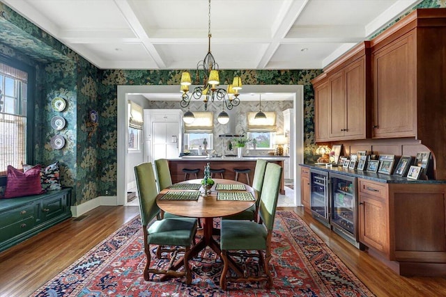 dining room with beamed ceiling, coffered ceiling, beverage cooler, and dark hardwood / wood-style flooring