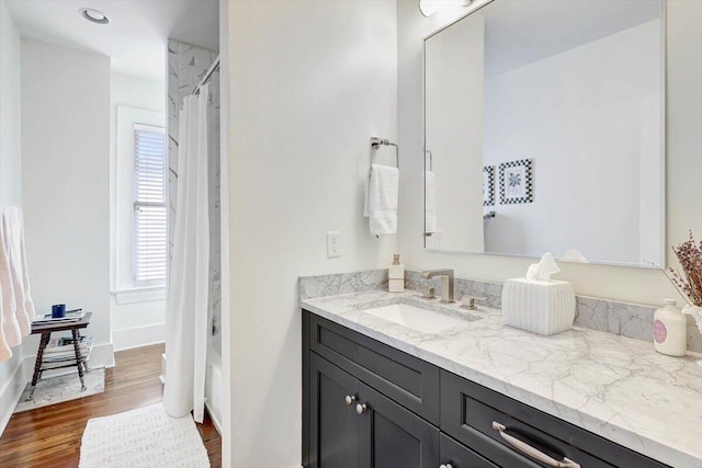 bathroom featuring vanity and wood-type flooring