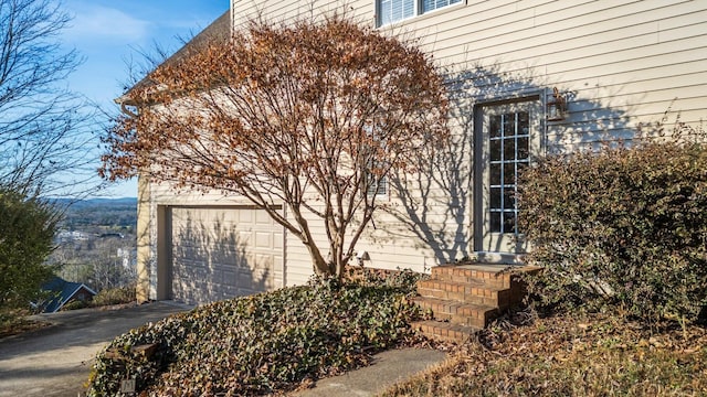 view of side of property featuring a garage