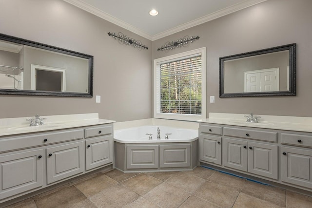 bathroom featuring crown molding, vanity, and a tub to relax in