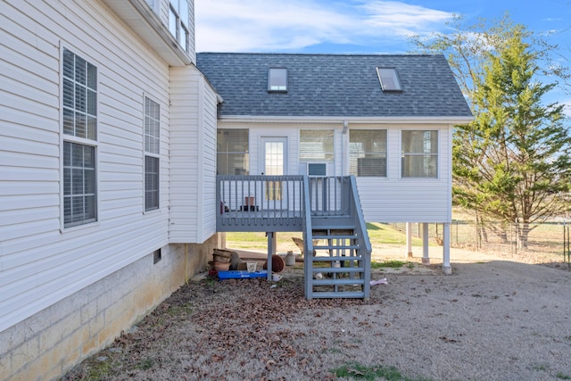 view of front of home with a deck