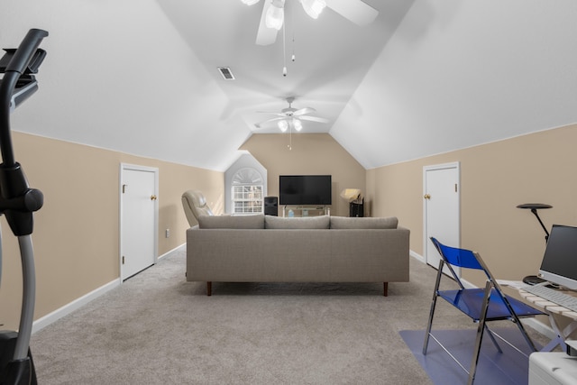 living room featuring ceiling fan, vaulted ceiling, and light carpet