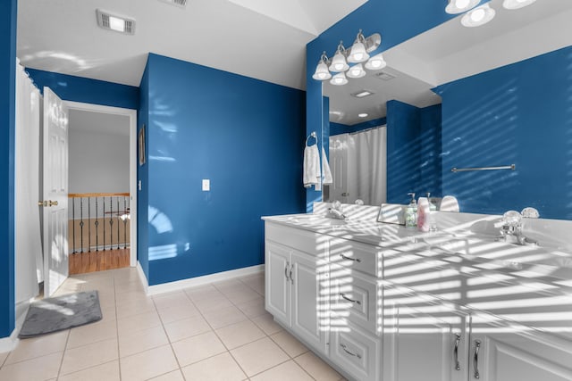 bathroom featuring sink and tile patterned floors