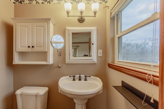 bathroom featuring sink and toilet