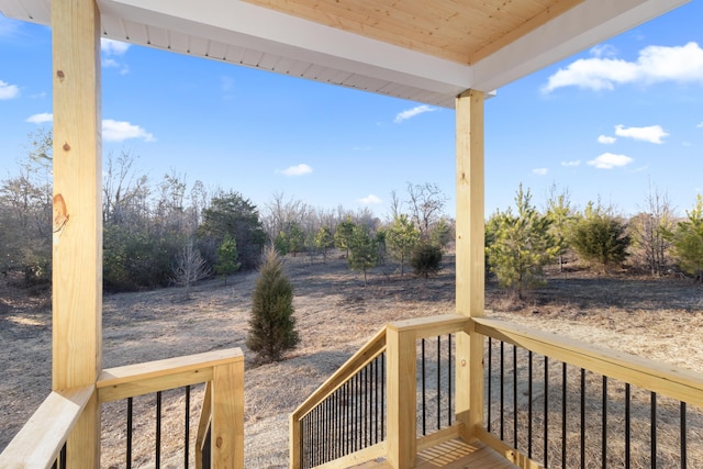 wooden terrace with a rural view