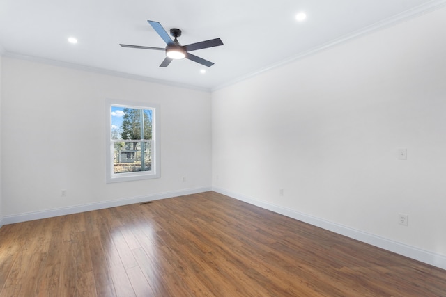 spare room with ornamental molding, hardwood / wood-style floors, and ceiling fan