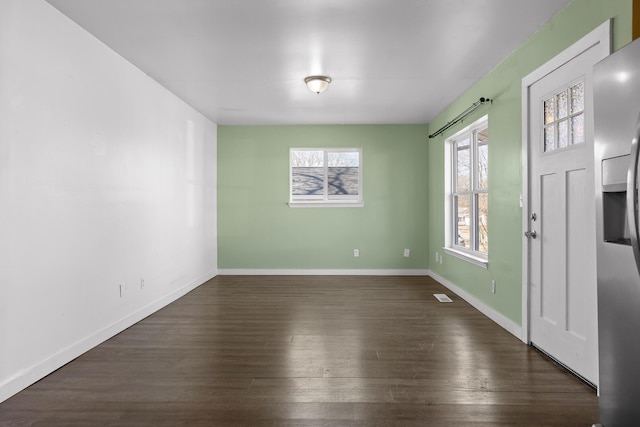 entrance foyer featuring dark wood-type flooring