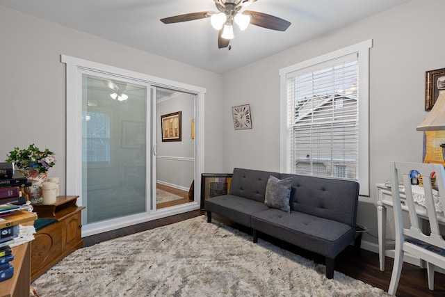 interior space with dark hardwood / wood-style floors and ceiling fan