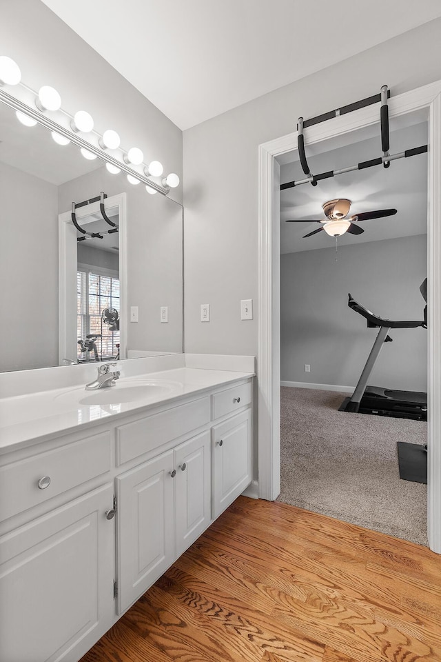 bathroom with vanity and ceiling fan