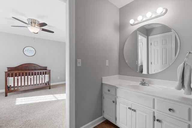 bathroom with vanity and ceiling fan