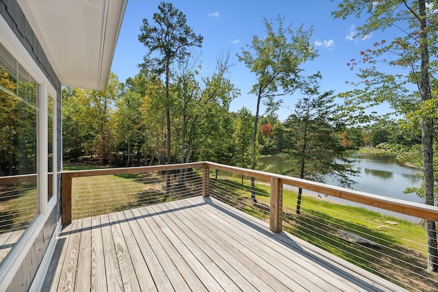 wooden terrace with a water view