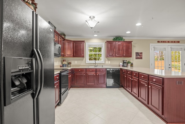 kitchen with french doors, sink, crown molding, kitchen peninsula, and black appliances