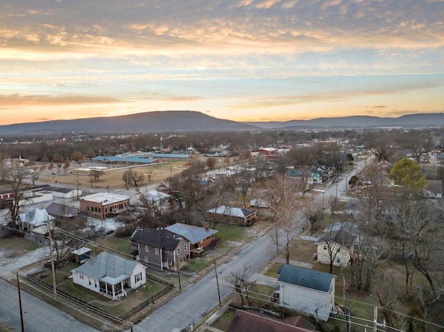 aerial view at dusk with a mountain view