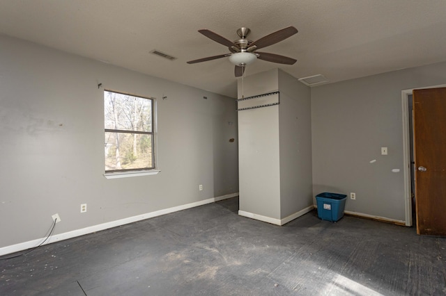 unfurnished bedroom featuring ceiling fan