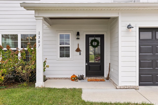 entrance to property featuring a garage