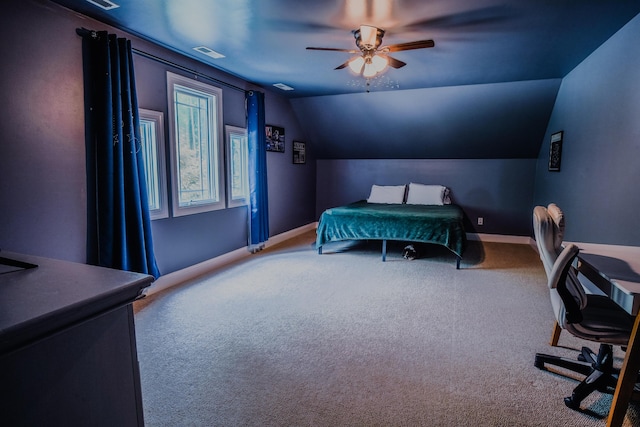 bedroom with vaulted ceiling, ceiling fan, and carpet