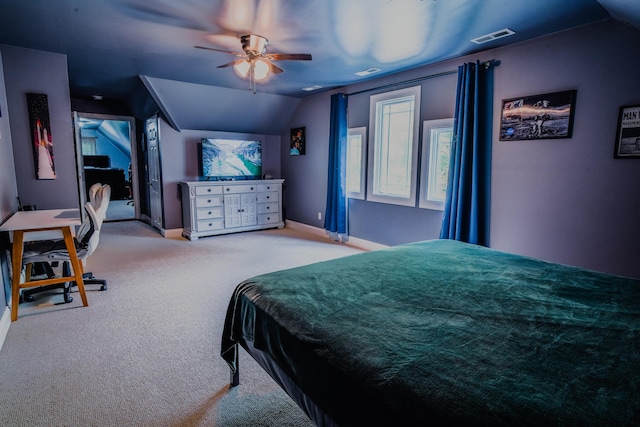 bedroom featuring lofted ceiling, light colored carpet, and ceiling fan