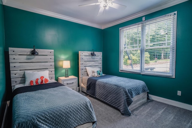 carpeted bedroom featuring ornamental molding and ceiling fan