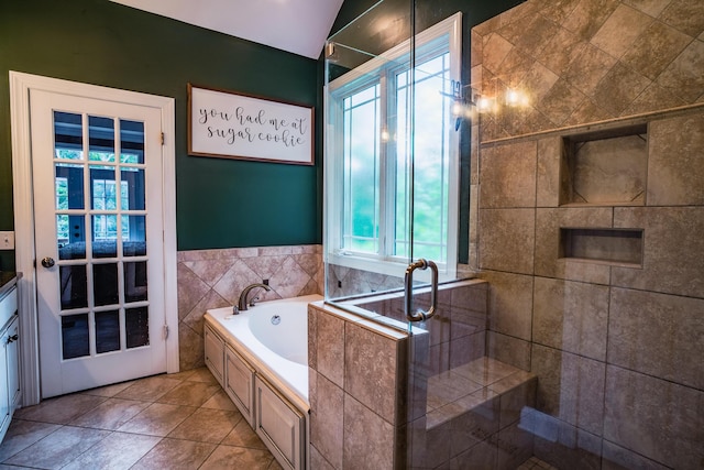 bathroom with vanity, separate shower and tub, and tile patterned floors