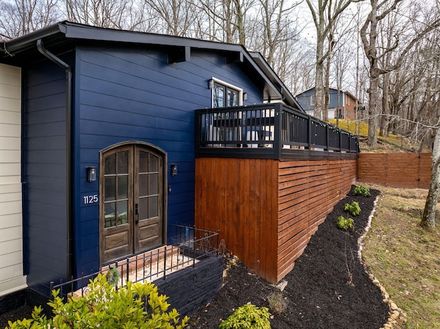 back of property featuring french doors