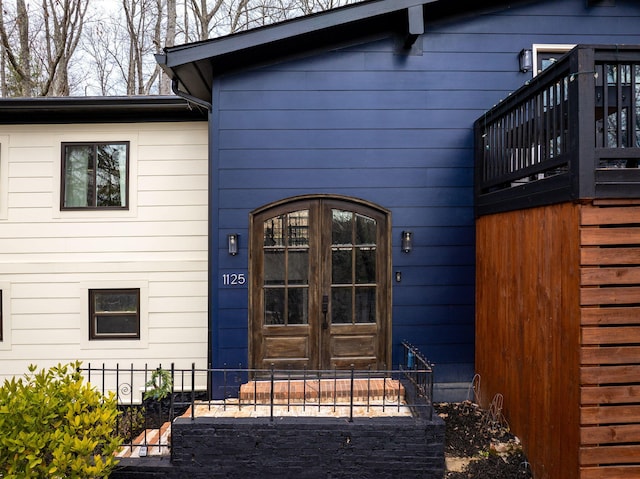 doorway to property featuring french doors