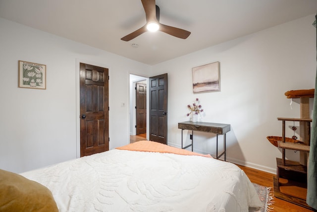 bedroom featuring ceiling fan and light wood-type flooring