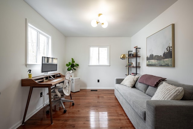 office space with hardwood / wood-style floors