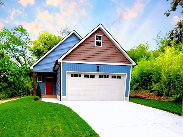 41 Greens Lake Rd, Rossville, GA 30741 - view of front of property with a front yard, concrete driveway, and a garage