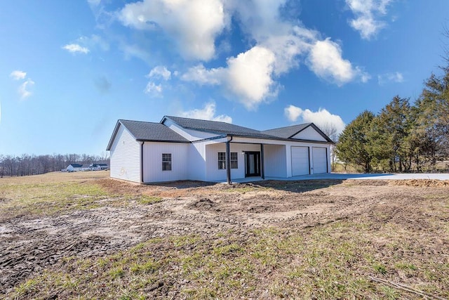 view of front of property with a garage