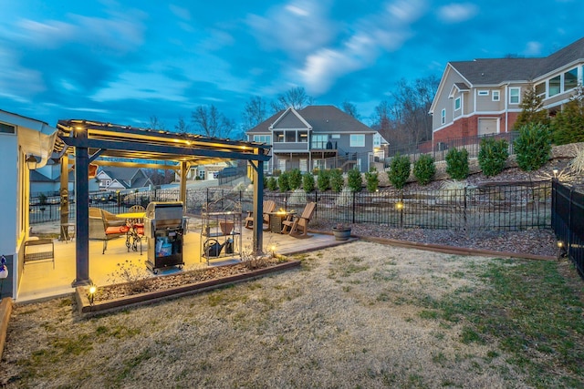 view of play area featuring a patio area, fence, and a pergola