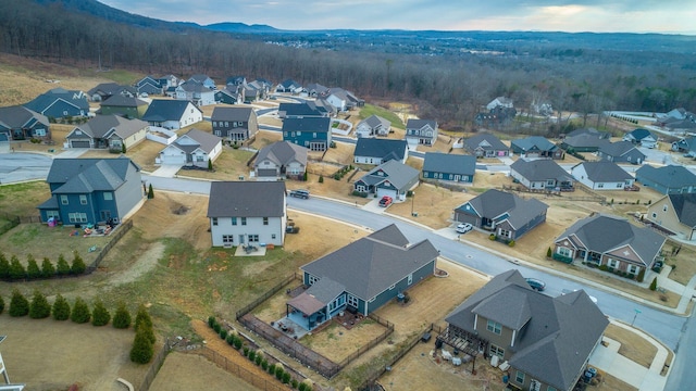 bird's eye view featuring a mountain view and a residential view