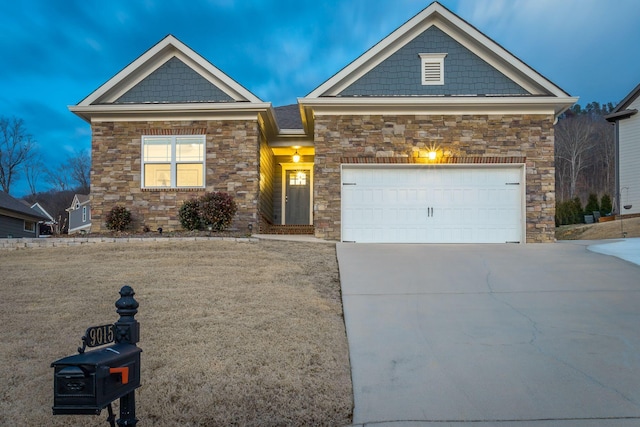 view of front of home with a garage and concrete driveway