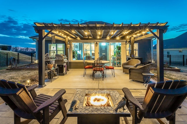 view of patio / terrace with an outdoor living space with a fire pit, a fenced backyard, a pergola, and area for grilling