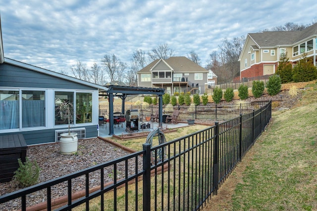 exterior space featuring a patio area, fence, a pergola, and a yard