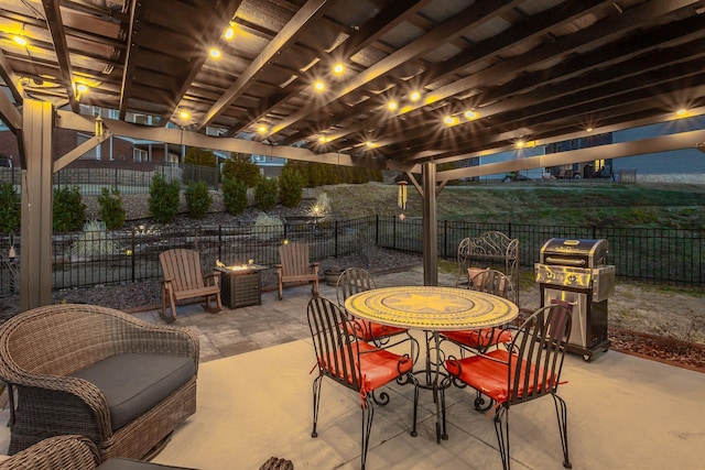 view of patio / terrace featuring outdoor dining area, a fenced backyard, and area for grilling