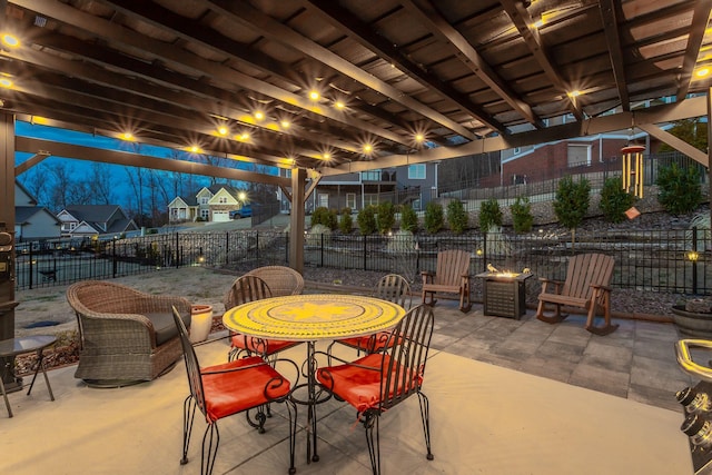 view of patio / terrace featuring fence and outdoor dining space