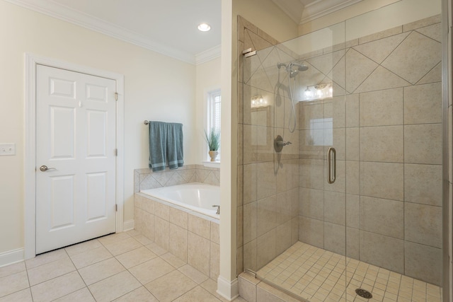 bathroom with a garden tub, baseboards, tile patterned floors, a stall shower, and crown molding