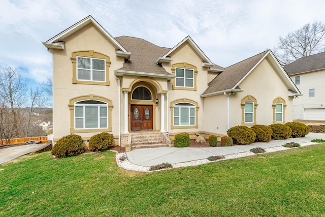 view of front of home with a front yard