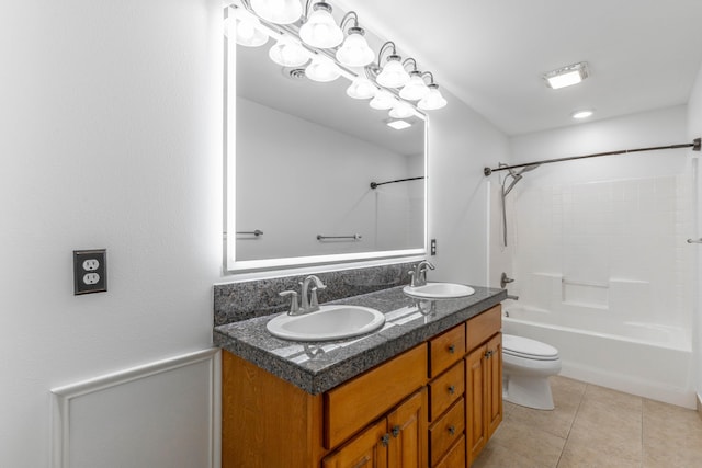 full bathroom featuring tile patterned flooring, vanity, shower / tub combination, and toilet