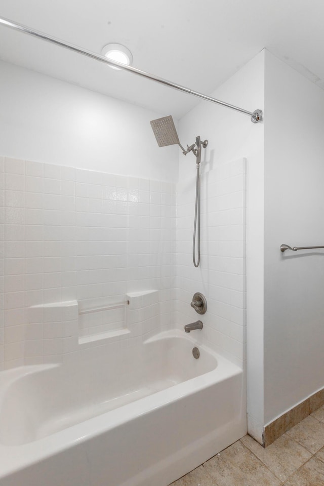 bathroom featuring  shower combination and tile patterned floors