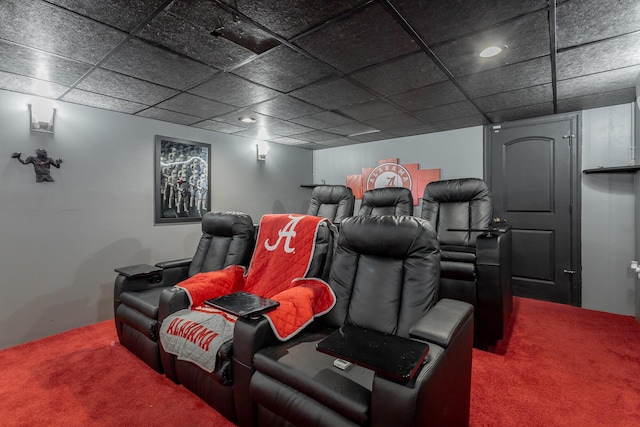 cinema with a drop ceiling and carpet