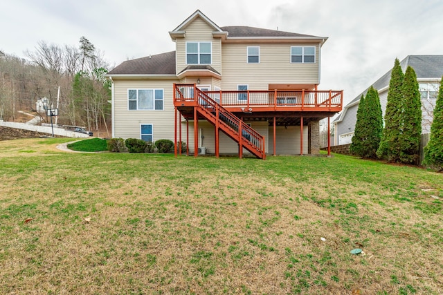 back of property featuring a yard and a deck