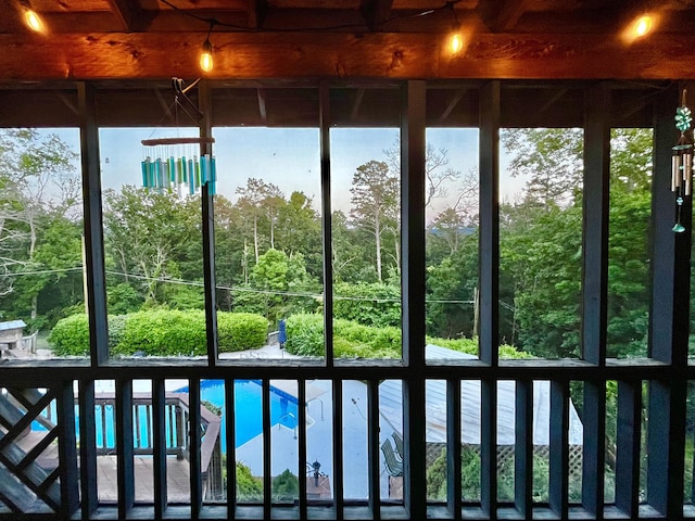 unfurnished sunroom with plenty of natural light