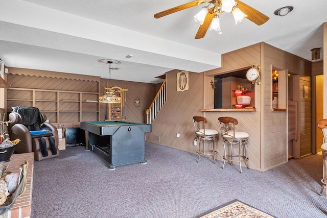 rec room featuring wooden walls, billiards, and dark colored carpet