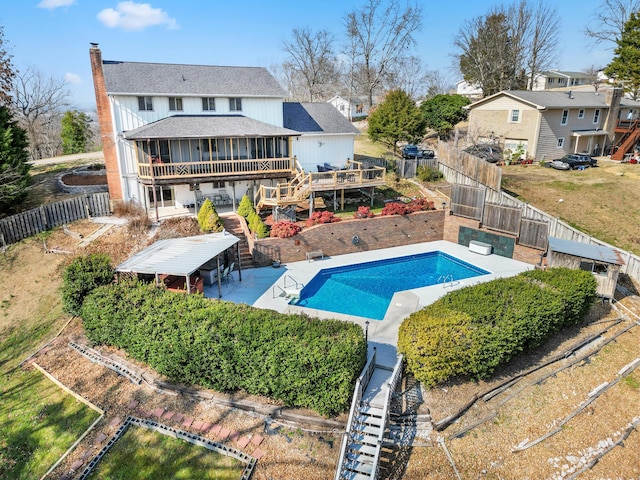 exterior space with a pool side deck