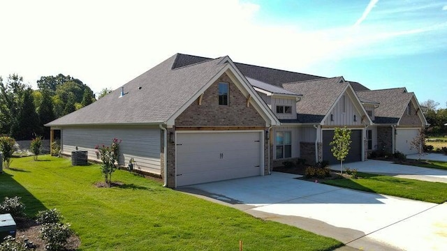 view of front of house with central AC unit and a front lawn