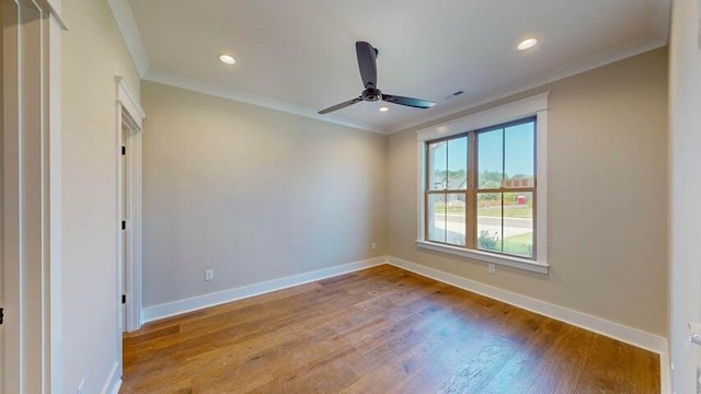 unfurnished room featuring crown molding, ceiling fan, and light hardwood / wood-style floors