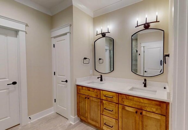 bathroom featuring vanity and ornamental molding